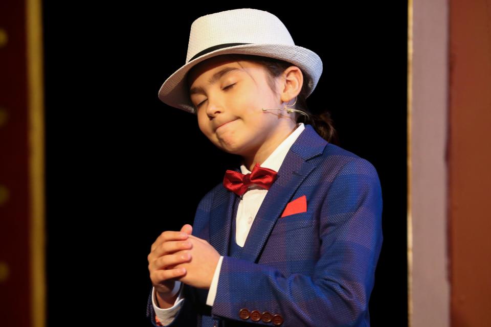 Liam Stewart, who portrays Fat Sam, acts annoyed from one of his "goons" during dress rehearsal of "Bugsy Malone" at Aurora Arts Theatre Wednesday, May 22, 2024.