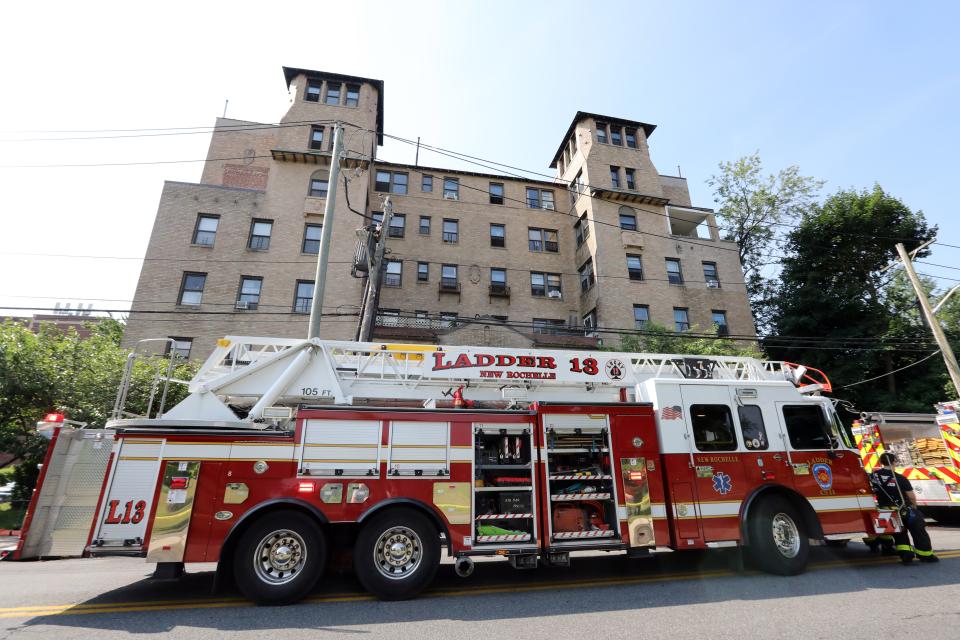 Firefighters respond to an apartment building fire at 30 Eastchester Road in New Rochelle June 21, 2024.