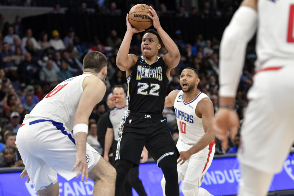 Memphis Grizzlies guard Desmond Bane (22) shoots against Los Angeles Clippers center Ivica Zubac, left, in the first half of an NBA basketball game Friday, March 31, 2023, in Memphis, Tenn. (AP Photo/Brandon Dill)