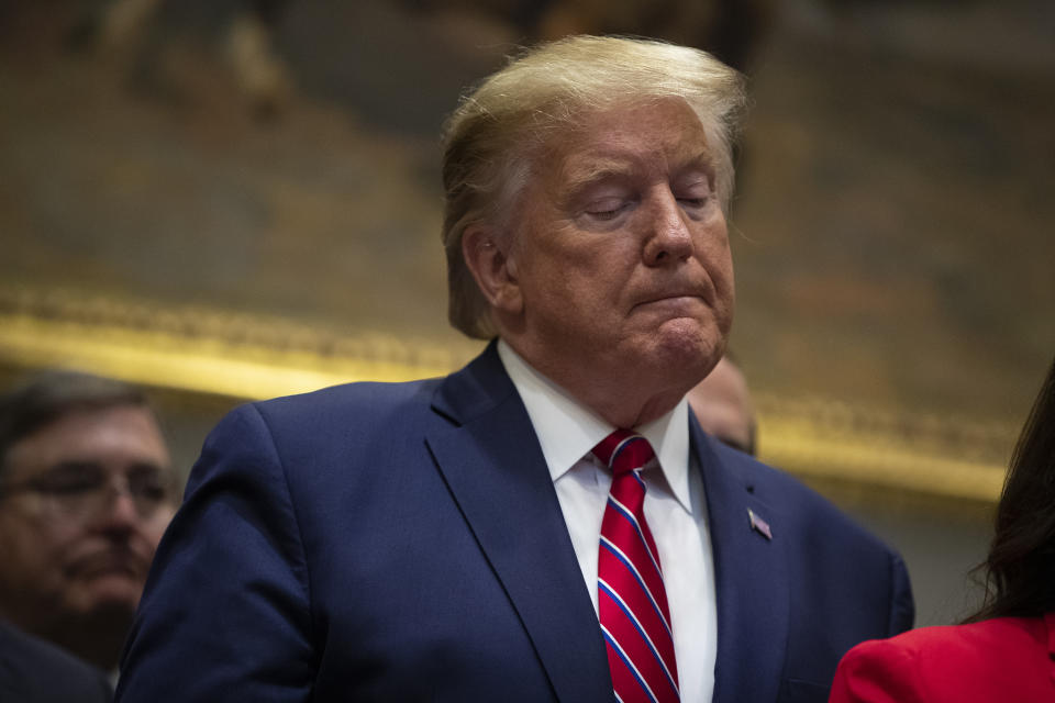 President Donald Trump pauses during an event on healthcare prices in the Roosevelt Room of the White House, Friday, Nov. 15, 2019, in Washington. (AP Photo/ Evan Vucci)