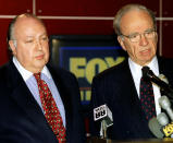 <p>News Corp. chief Rupert Murdoch, right, speaks at a press conference in New York on Jan. 30, 1995, where he announced that cable-TV figure Roger Ailes, left, would head the new Fox 24-hour news network. (Photo: Peter Morgan/Reuters) </p>