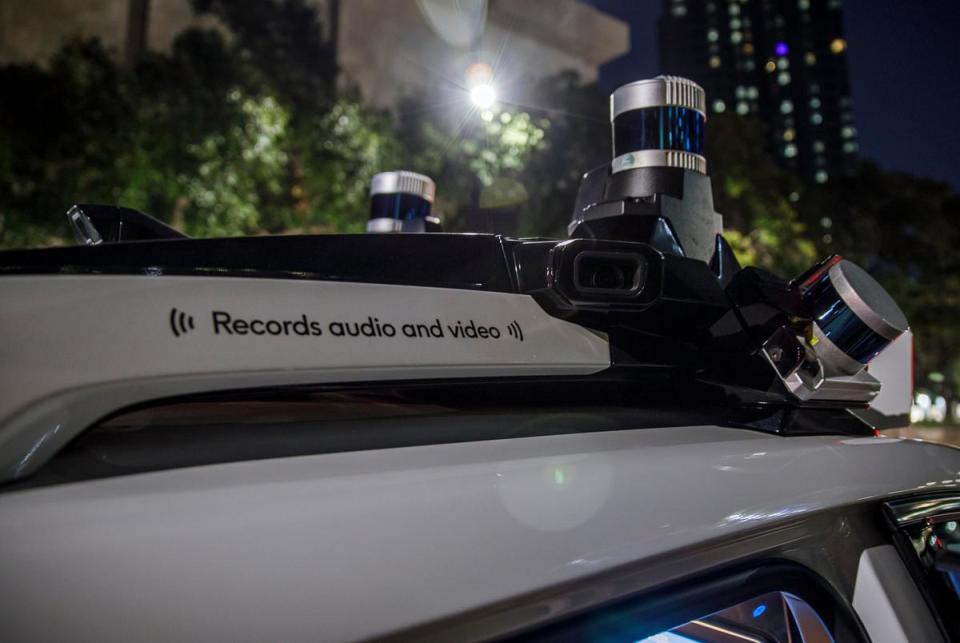 Sensors bedeck an autonomous Cruise taxi in downtown Austin on Sept. 26, 2023. Cruise, a San Francisco-based autonomous car company, is one of several autonomous driving companies that test vehicles in Austin.