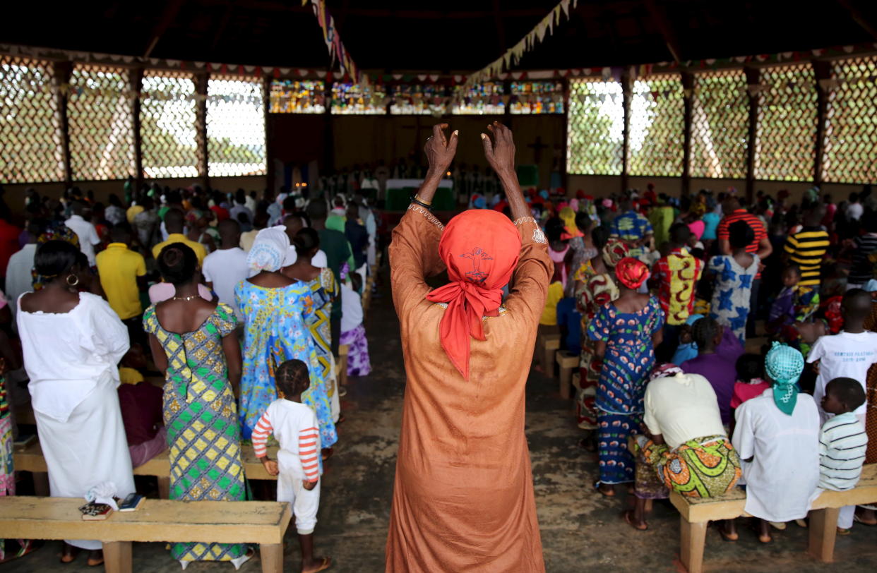 Faithful pray during a Sunday Mass in Saint Joseph Cathedral in Bambari, Central African Republic, on Oct. 18, 2015. (Photo: Goran Tomasevic/Reuters)