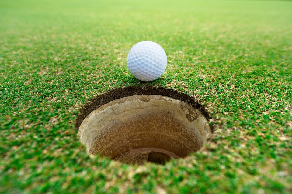 Spring has arrived when golfers start making their way to the courses after limbering up at a driving range.