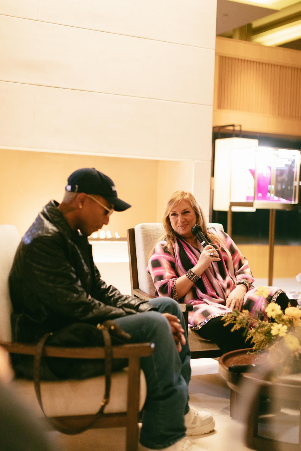 Pharrell Williams and Loraine Schwartz at an Open to Art talk around the “A Journey Through Gems” auction.