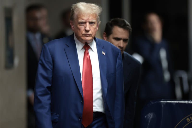 Former President Donald Trump leaves at the end of the day in his trial at Manhattan criminal court in New York on Monday. Pool Photo by Win McNamee/UPI