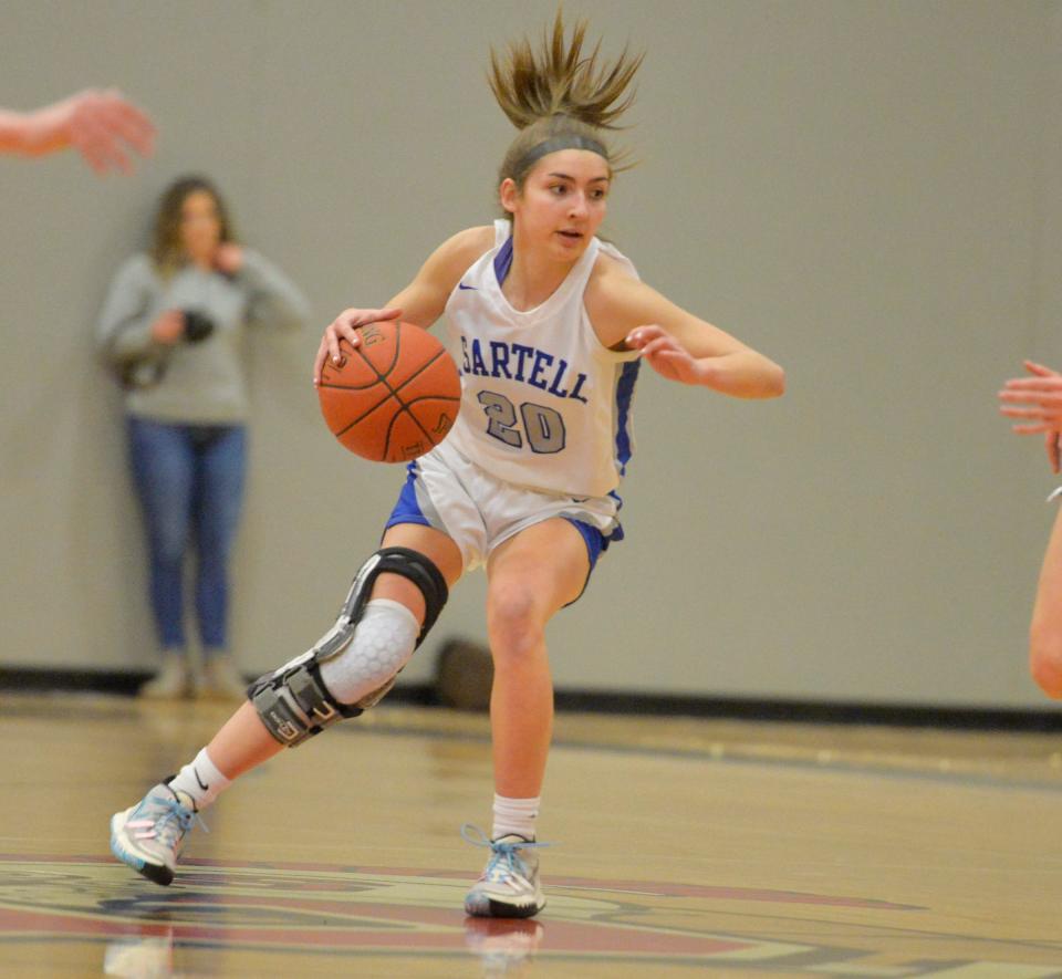 Sartell's Avery Templin cuts and drives towards the basket as ROCORI battles Sartell at ROCORI High School on Tuesday, Jan. 25, 2022. 
