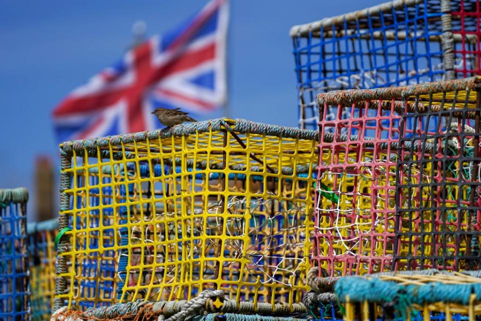 Empty fishing nets sit on the beach at Hastings, Sussex (Steve Parsons/PA) (PA Wire)