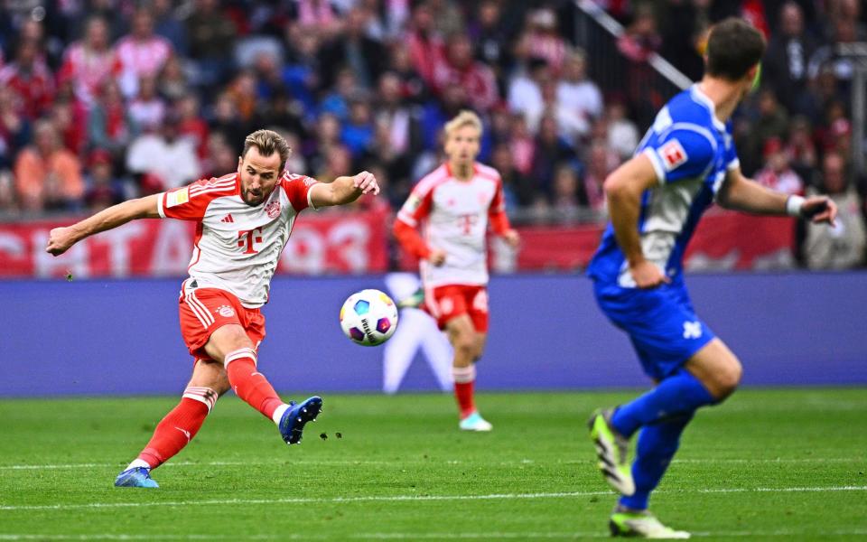 Harry Kane scores from the halfway line for Bayern Munich