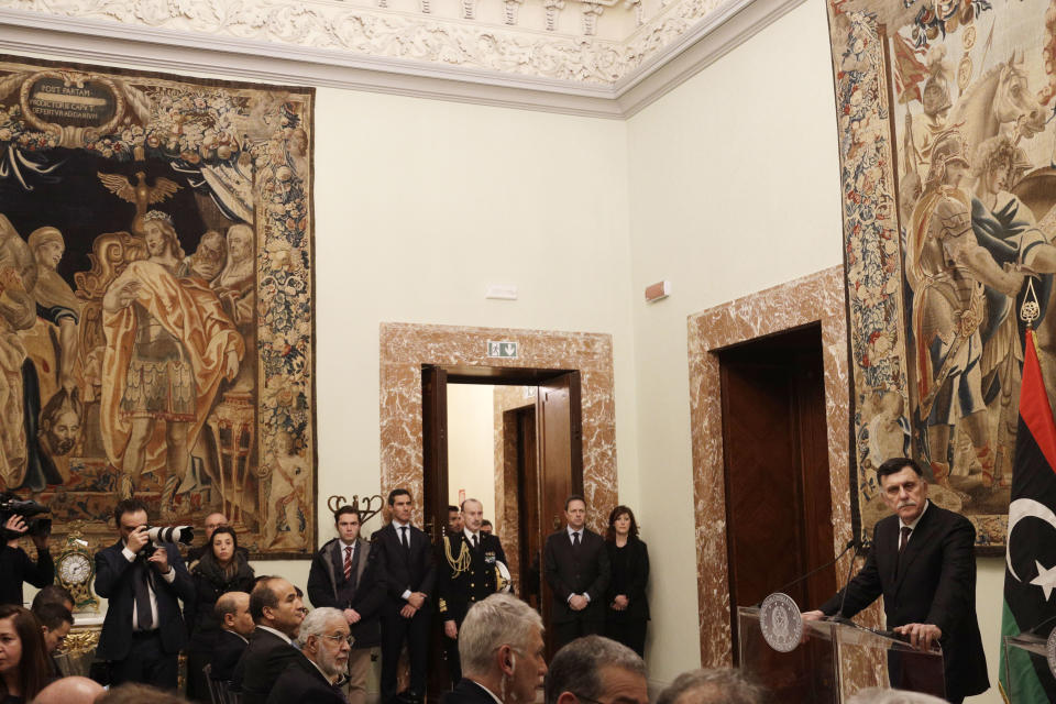 Libya's Prime Minister Fayez al-Sarraj holds a press conference after his meeting with Italian Premier Giuseppe Conte at Chigi palace, in Rome, Saturday, Jan. 11, 2020. (AP Photo/Gregorio Borgia)