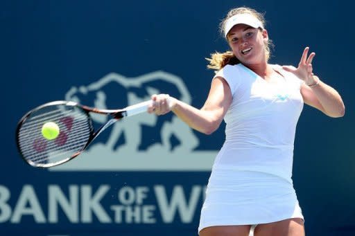 Coco Vandeweghe returns a shot to Urszula Radwanska of Poland during the Bank of the West Classic at Stanford University Taube Family Tennis Stadium on July 13 in Stanford, California. Vandeweghe won 6-4, 6-4