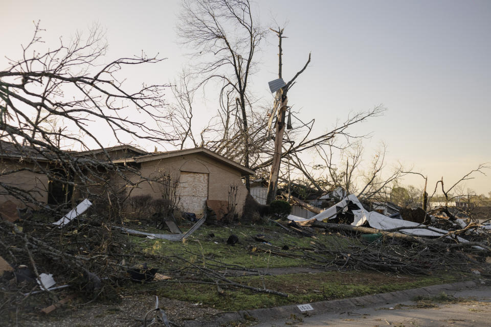 Homes are damaged in a neighborhood from a storm in Little Rock, Ark., on Saturday, April 1, 2023. Unrelenting tornadoes that tore through parts of the South and Midwest that shredded homes and shopping centers. (AP Photo/Sha'Cori Washington)