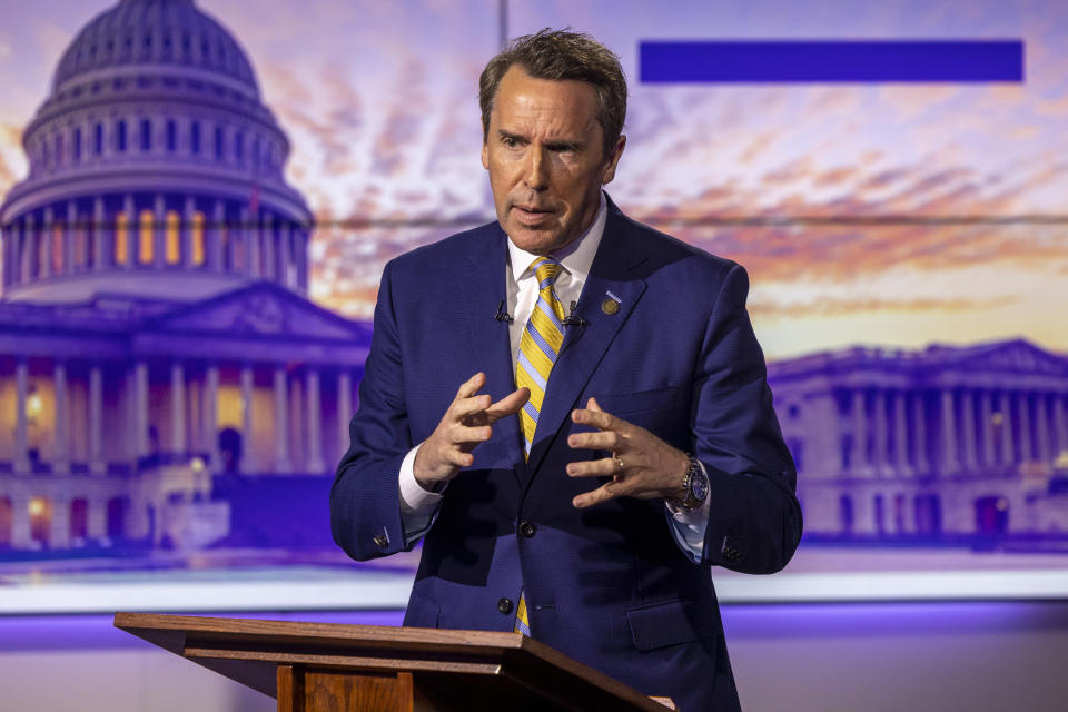 Republican U.S. Senate candidate Mark Walker answers a question during an hour-long debate moderated by Spectrum News political anchor Tim Boyum at the Spectrum News studio in Raleigh, N.C. Wednesday, April 20, 2022. (Travis Long/The News & Observer via AP)