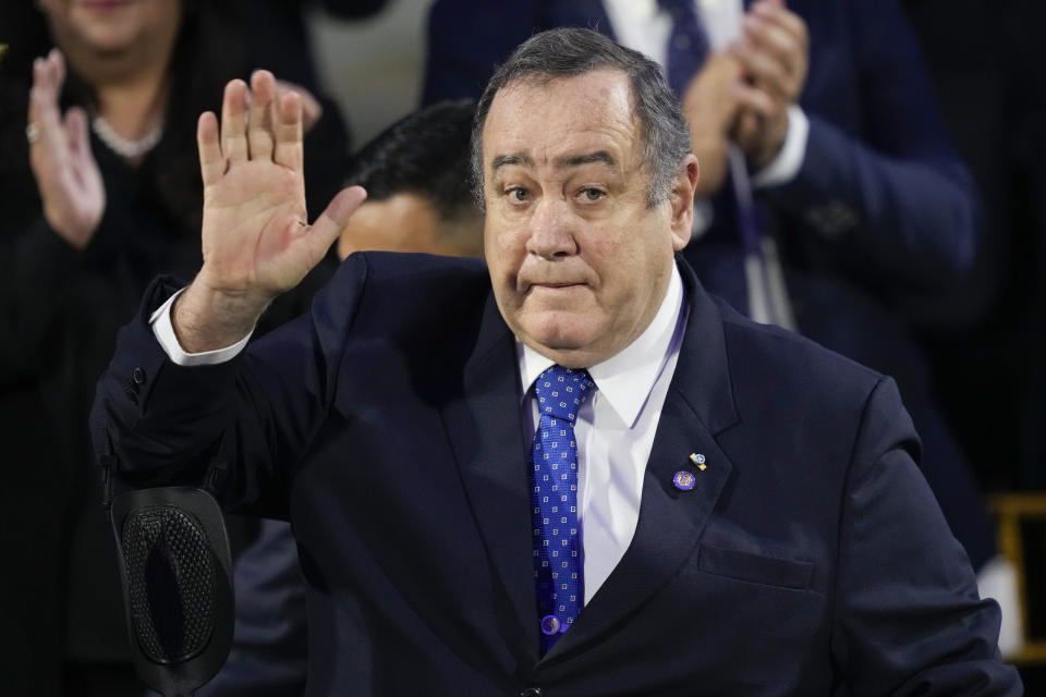 Outgoing Guatemalan President Alejandro Giammattei arrives to give his annual report at the National Palace in Guatemala City, Friday, Jan. 12, 2024. Giammattei ends his four year term on Sunday. (AP Photo/Moises Castillo)