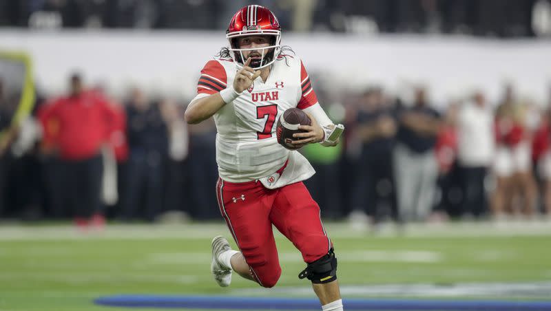 Utah QB Cameron Rising runs with the ball while playing USC in the Pac-12 championship game at the Allegiant Stadium in Las Vegas on Friday, Dec. 2, 2022.