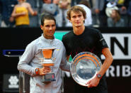 Tennis - ATP World Tour Masters 1000 - Italian Open - Foro Italico, Rome, Italy - May 20, 2018 Spain's Rafael Nadal poses with the winners trophy and Germany's Alexander Zverev poses with the runner up trophy after Nadal won the final REUTERS/Tony Gentile