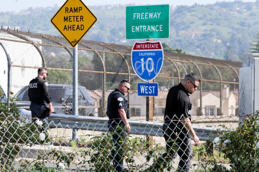 Covina, California - April 22: UA Los Angeles County sheriff's deputy is being treated after apparently being shot in the West Covina area in an area near the San Bernardino, 10, Freeway and Barranca Avenue on Monday, April 22, 2024 in Covina, California. Reports from the scene indicate the deputy was struck in a bulletproof vest and is awake and alert, but is being taken to a hospital to be checked out. Police have set up a perimeter in the area in search of a suspect, and there are unconfirmed reports that one person has been detained. (Robert Gauthier / Los Angeles Times)