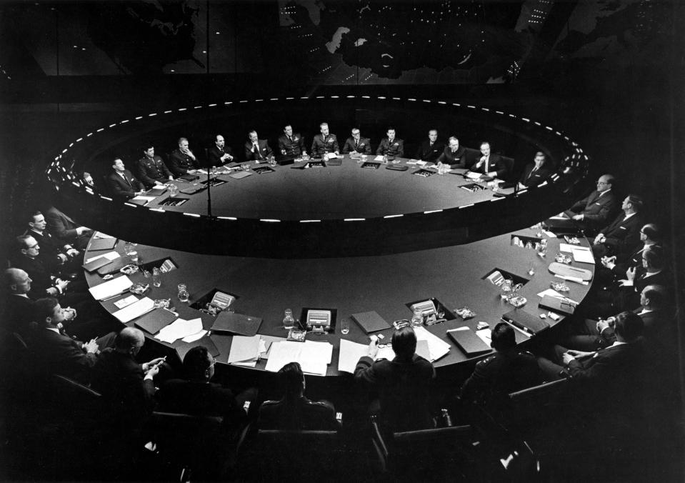 A scene from Dr. Strangelove: or How I Learned to Stop Worrying and Love the Bomb, directed by Stanley Kubrick.