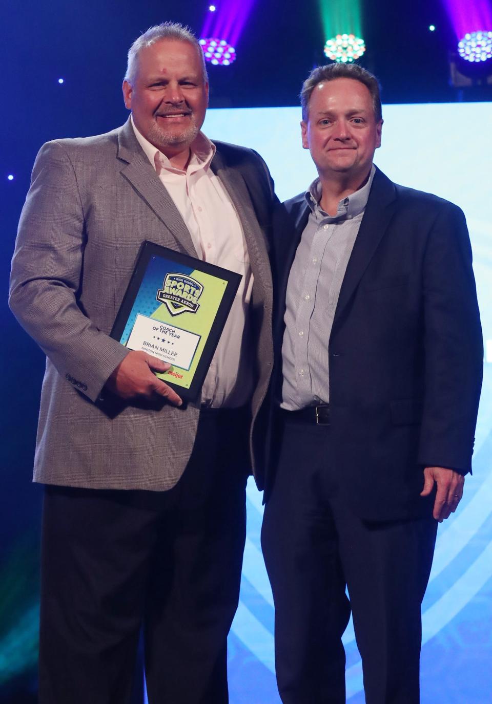 Norton High's Brian Miller greater Akron Coach of the Year with Beacon Journal editor Michael Shearer at the High School Sports All-Star Awards at the Civic Theatre in Akron on Friday.