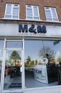 A view of M&M Hair Academy in London, Wednesday, April 16, 2014. Staff at a London hair salon say they had a close shave with North Korean officials after using the country's leader, Kim Jong Un, to promote discount haircuts. M&M Hair Academy says it received a visit by two men from the nearby North Korean embassy after putting up a poster last week featuring a picture of Kim — who sports a distinctive undercut — and the slogan "Bad Hair Day?" (AP Photo/Kirsty Wigglesworth)