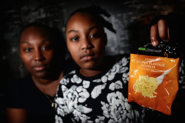 Malika Carrington with her mum Keisha and a bag of noodles