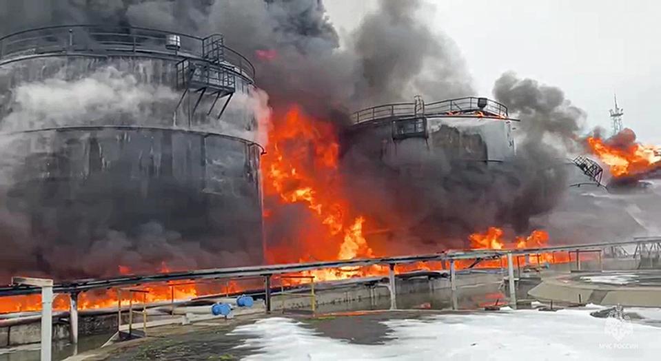 In this photo taken from video released by Governor of Bryansk Region Alexander Bogomaz telegram channel AV BogomaZ on Friday, Jan. 19, 2024, Oil reservoirs are seen in fire after the drone reached Klintsy, a city in Bryansk Region of Russia, about 60 kilometers (40 miles) from the Russia-Ukrainian border. A Russian official says a Ukrainian drone has struck an oil storage depot in western Russia, causing a massive blaze. (Governor of Bryansk Region Alexander Bogomaz telegram channel AV BogomaZ via AP)