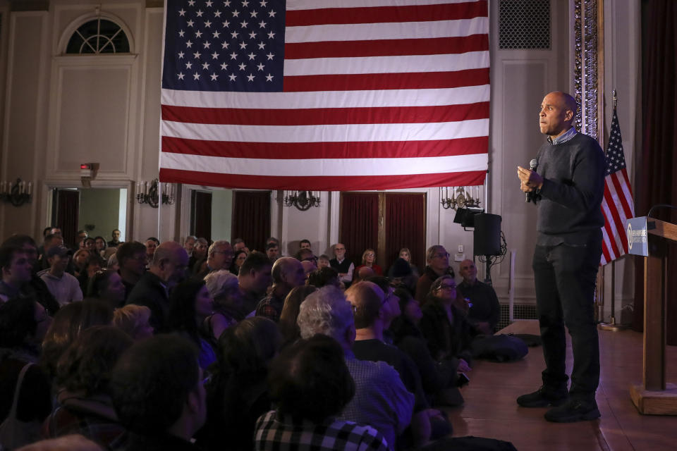 CORRECTS TO SATURDAY, NOT SUNDAY-U.S. Sen. Cory Booker, D-N.J., pauses while sharing a personal story while speaking at a post-midterm election victory celebration in Manchester, N.H., on Saturday, Dec. 8, 2018. (AP Photo/Cheryl Senter)