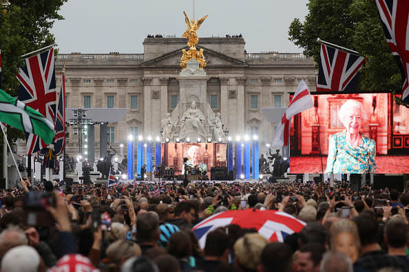 <div class="inline-image__caption"><p>People gather along The Mall for the Platinum Party At The Palace concert outside Buckingham Palace on June 4, 2022 in London, United Kingdom.</p></div> <div class="inline-image__credit">Hollie Adams/Getty Images</div>