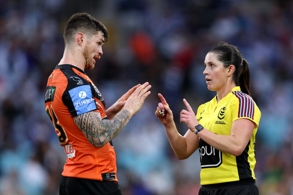 SYDNEY, AUSTRALIA - MAY 04: Referee, Kasey Badger speaks with John Bateman of the Tigers during the round nine NRL match between Canterbury Bulldogs and Wests Tigers at Accor Stadium, on May 04, 2024, in Sydney, Australia. (Photo by Brendon Thorne/Getty Images)