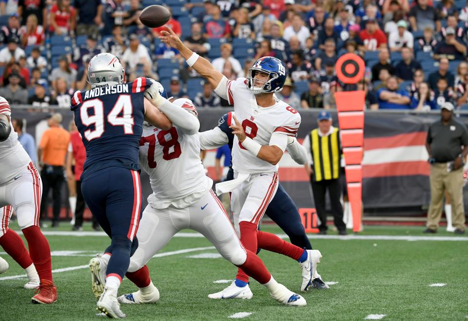 Aug 11, 2022; Foxborough, Massachusetts, USA; New York Giants quarterback Daniel Jones (8) throws against the New England Patriots during the first half of a preseason game at Gillette Stadium. Mandatory Credit: Eric Canha-USA TODAY Sports
