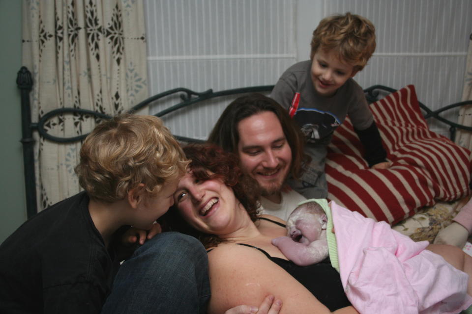 Taken at the homebirth of my daughter, Lucy Nova, on 1/9/09 with her brothers Parker and Simon present and eager. 