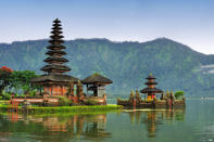 <div class="caption-credit"> Photo by: Shuttershock</div><div class="caption-title">Bali</div>As only one of thousands of islands in the Indonesian archipelago, Bali is known for its lush forests, breathtaking rice terraces, and beautiful temples. This picturesque destination is perfect for spiritual seekers and those in search of romantic tranquility.
