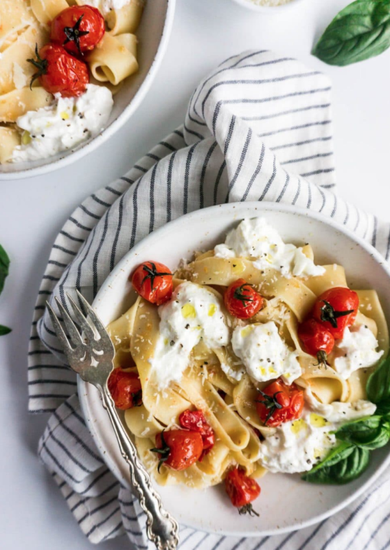 <p>Pina Bresciani</p><p>The flavors of the burrata, tomatoes and fresh basil are a classic combination and the flavors work amazingly well together.</p><p><strong>Get the recipe: <a href="https://pinabresciani.com/pappardelle-burrata-burst-cherry-tomatoes/" rel="nofollow noopener" target="_blank" data-ylk="slk:Burst Cherry Tomato Pasta with Creamy Burrata;elm:context_link;itc:0;sec:content-canvas" class="link rapid-noclick-resp"><em>Burst Cherry Tomato Pasta with Creamy Burrata</em></a></strong></p>