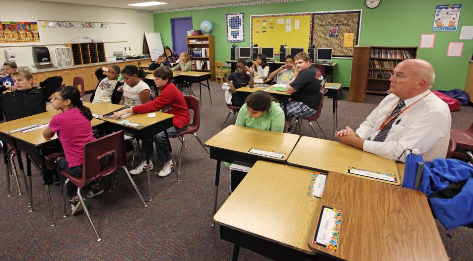 West Des Moines superintendent Tom Narak sits in with a Spanish lauguage class at Crestview Elementary on Oct. 21, 2010. He retired from the district after 41 years in education at the end of the 2010-2011 school year.