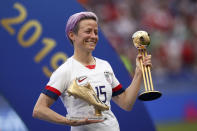 United States' Megan Rapinoe poses with her individual awards at the end of the Women's World Cup final soccer match between US and The Netherlands at the Stade de Lyon in Decines, outside Lyon, France, Sunday, July 7, 2019. The US defeated the Netherlands 2-0. (AP Photo/Francisco Seco)