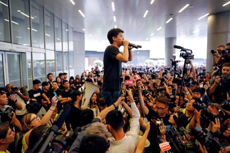 FILE PHOTO: Demonstration demanding Hong Kong's leaders to step down and withdraw the extradition bill, in Hong Kong