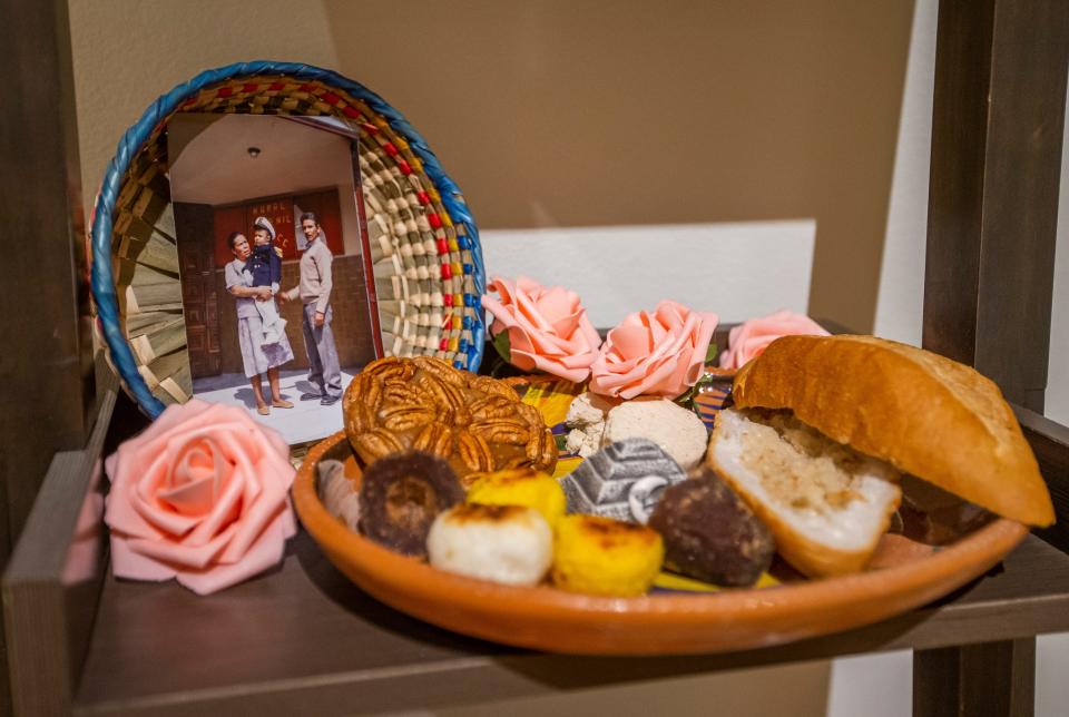 This family photo and Mexican sweets are just a part of "Enamorarse a la Mexicana," by Elle Velazquez, in the "Around the Bend" exhibit at the South Bend Museum of Art.