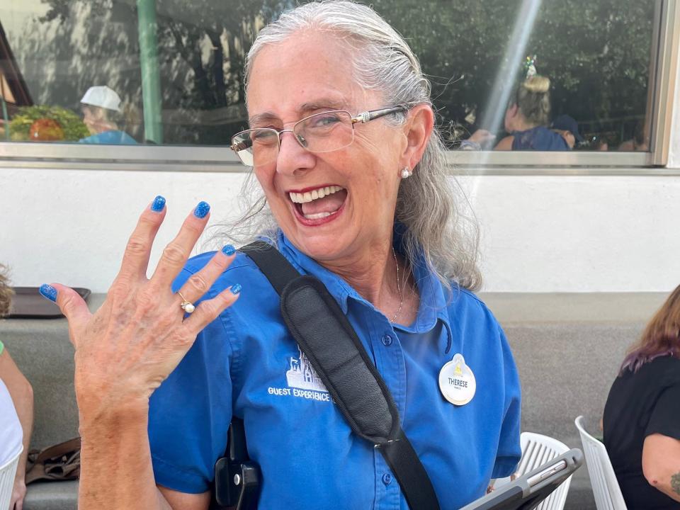 disney cast member wearing 50th anniversary nametag