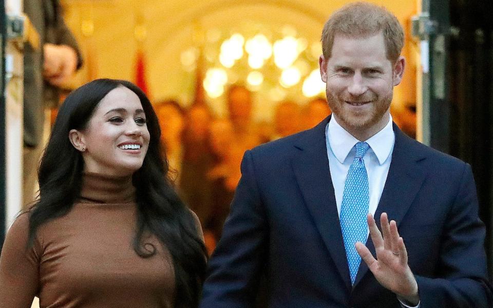 FILE - Prince Harry and Meghan, the Duke and Duchess of Sussex, leave after visiting Canada House on Jan. 7, 2020, in London. Harry and Meghan stepped away from full-time royal life in early 2020, and Buckingham Palace on Friday Feb. 19, 2021, confirmed the couple will not be returning to royal duties, and Harry will give up his honorary military titles.  - Frank Augstein/AP Photo
