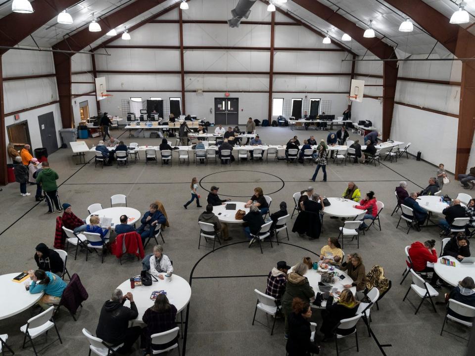 Residents receive $1000 checks and reimbursements for evacuation expenses from employees of Norfolk Southern on February 17, 2023 in New Waterford, Ohio. On February 3rd, a Norfolk Southern Railways train carrying toxic chemicals derailed causing an environmental disaster. Thousands of residents were ordered to evacuate after the area was placed under a state of emergency and temporary evacuation orders.