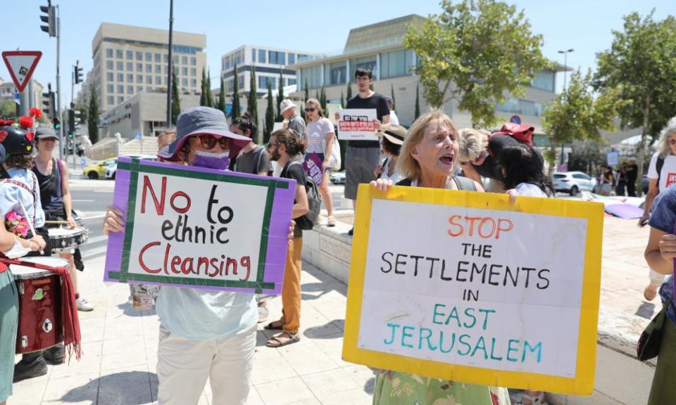 Israeli leftwing activists protest against government policy regarding Palestinians in East Jerusalem outside the supreme court in Jerusalem