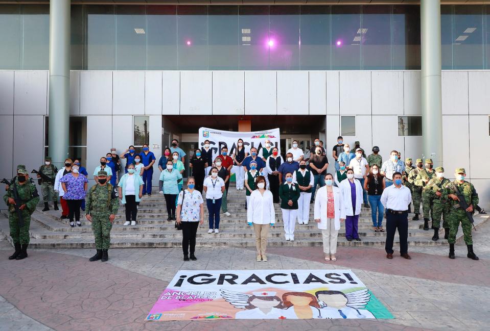 Medical staff pose during a recognition for their work at the General Hospital of Zone 4 of the IMSS on April 20.