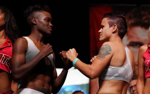 Nicola Adams (left) and Alexandra Vlajk face off during their official weigh-in at MGM Grand Garden Arena  - Credit: Getty