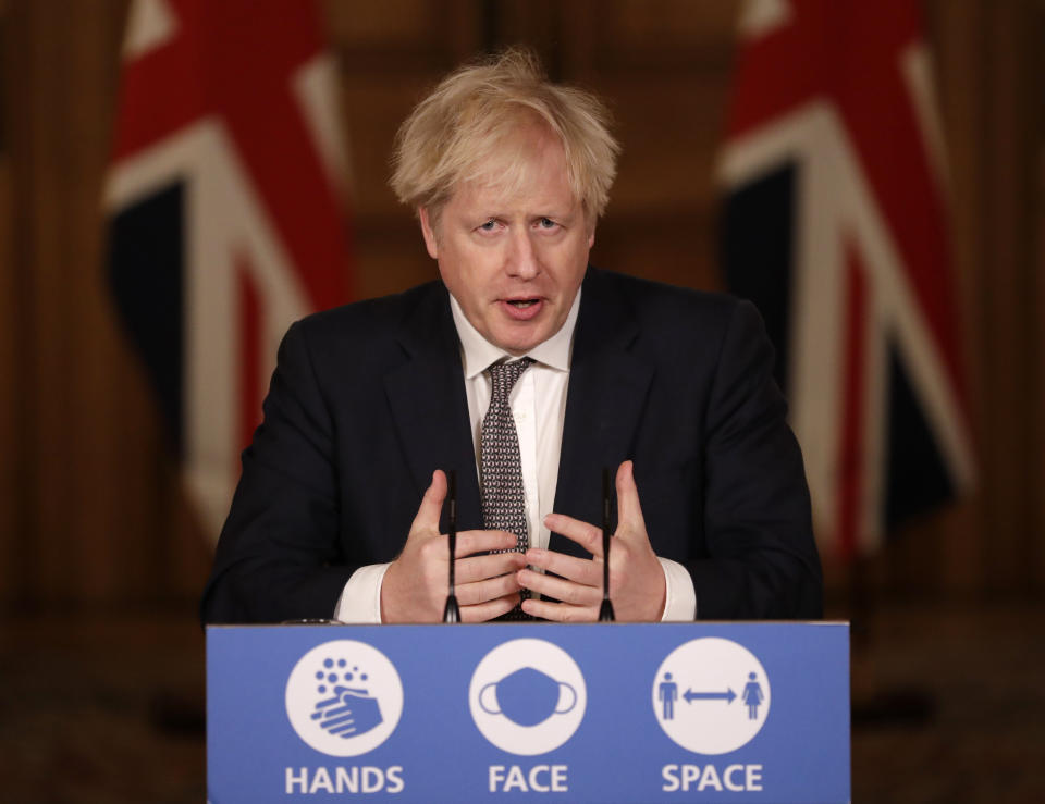 LONDON, ENGLAND - DECEMBER 16: United Kingdom Prime Minister Boris Johnson speaks during a news conference on the ongoing situation with the coronavirus pandemic, inside 10 Downing Street on December 16, 2020 in London, England. (Photo by Matt Dunham - WPA Pool/Getty Images)