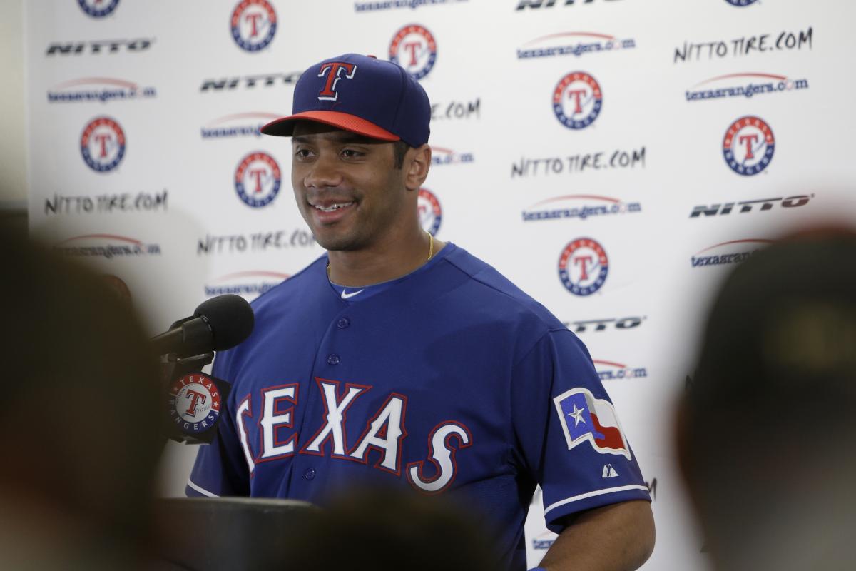 Russell Wilson enjoys time with Texas Rangers