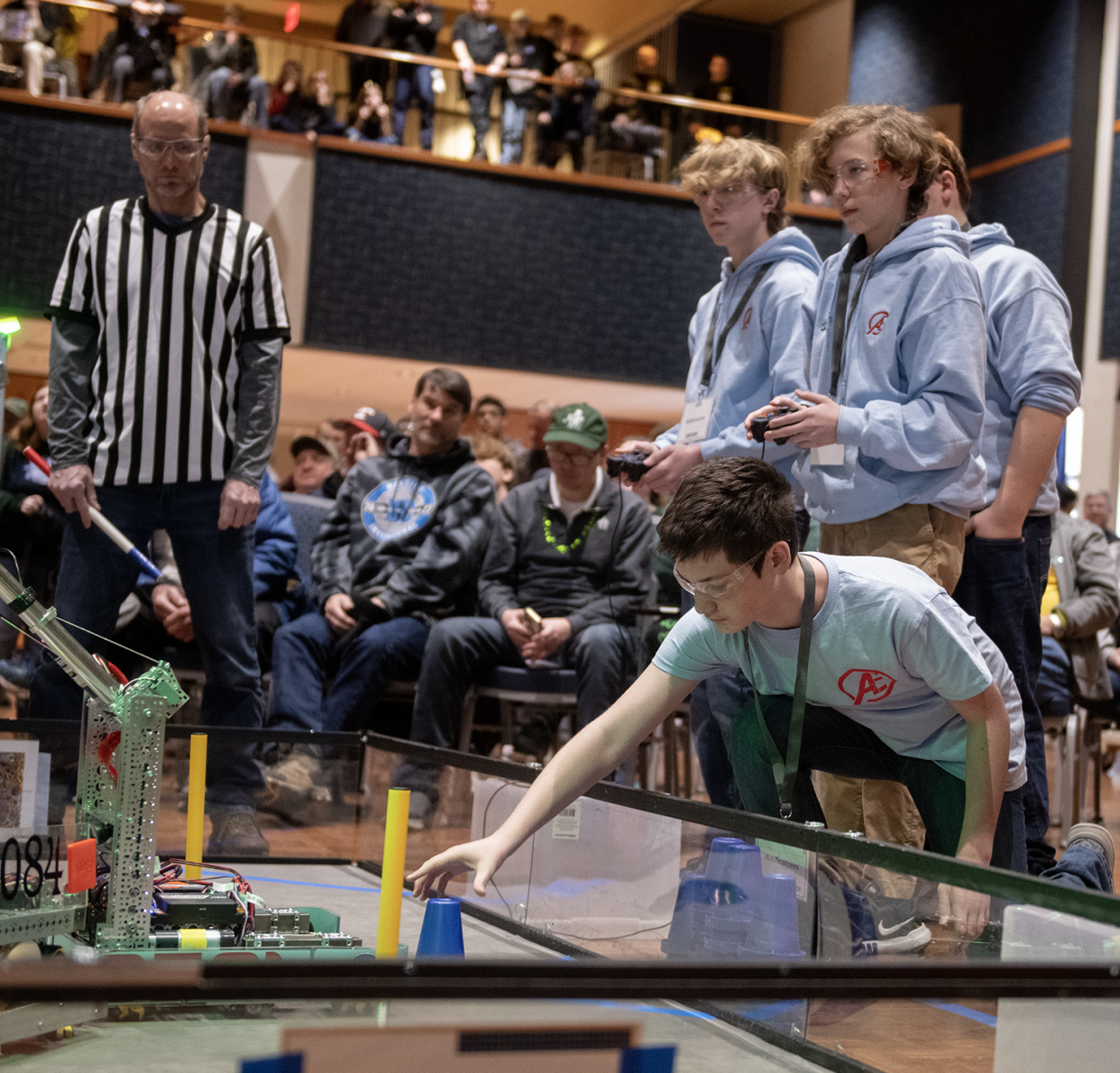 Noah Chaney, 14, and his team, Aedificatores — Owen Crawley, 14, Blake Simpkins, 14, and Maddex Fildes, 14, all of Kent — compete in the qualification round.