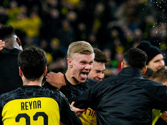 Haaland celebrates his winner for Dortmund (AFP)