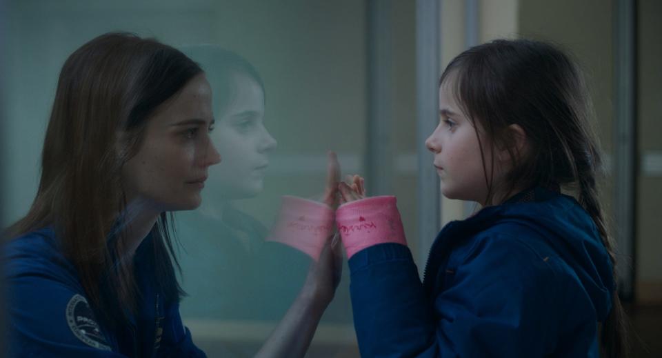 A French astronaut (Eva Green, left) juggles her dream of reaching space with the responsibility of caring for her daughter (Zélie Boulant-Lemesle) in "Proxima."