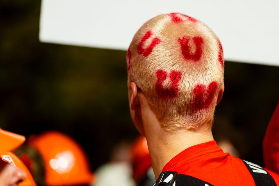 A University of Utah student shows off his died hair before the filming of ESPN’s “College GameDay” show at the University of Utah in Salt Lake City on Saturday, Oct. 28, 2023. | Megan Nielsen, Deseret News