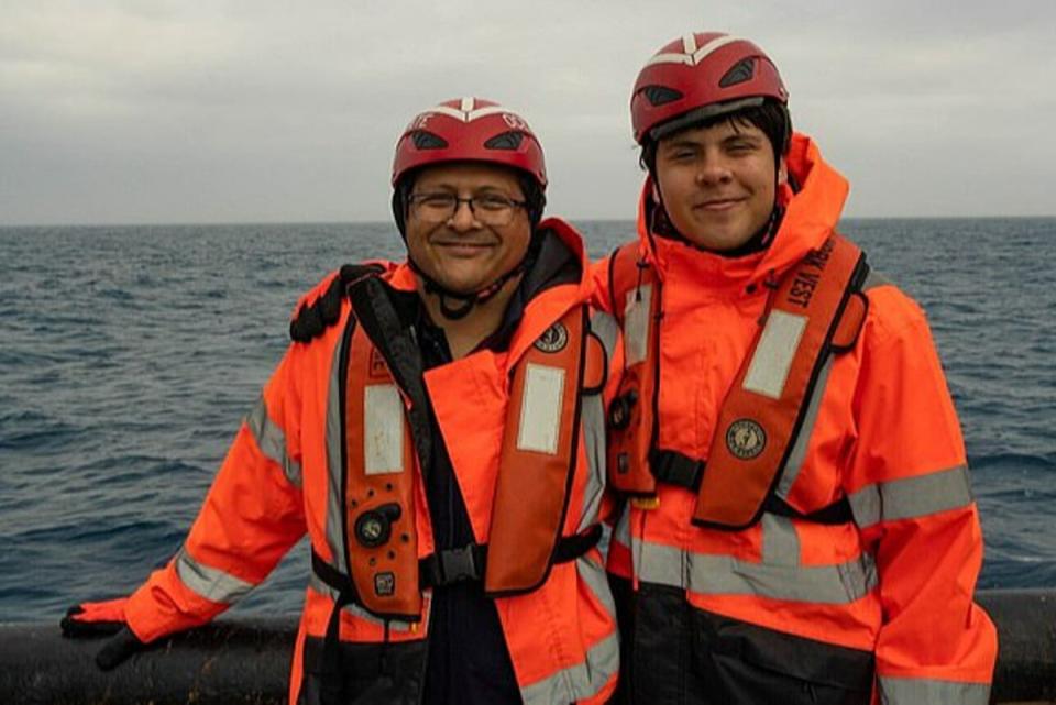 Shahzada Dawood pictured alongside his son Suleiman before boarding the Titan submersible (.)